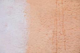 External plasters with terracotta and mesh